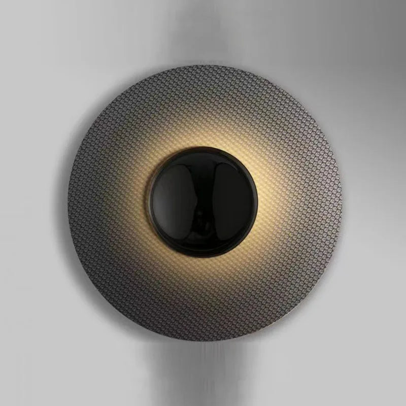 Modern circular designer wall light for an elegant interior