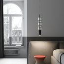 Modern glass pendant light with gold and black metal