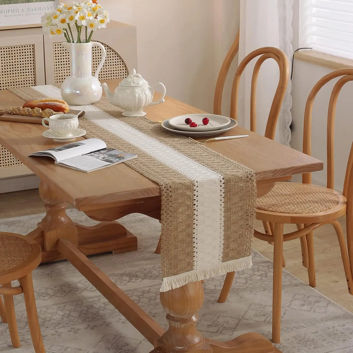 Beige boho table runner with geometric patterns and tassels