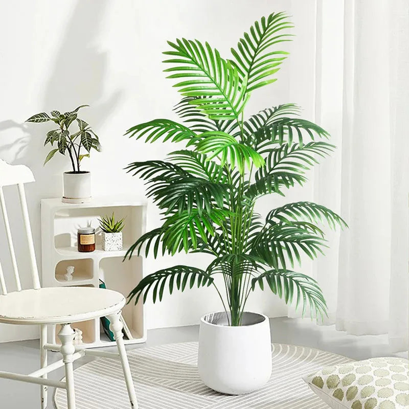 Tropical artificial plants palm tree and monstera for indoor and outdoor decor