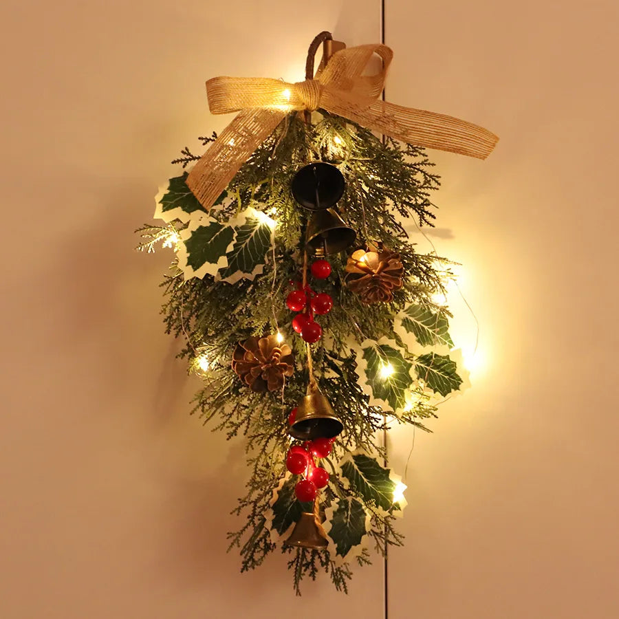 Christmas wreath door decoration with berries and bells