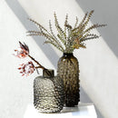 clear glass vase with black dots for decoration and floral arrangements