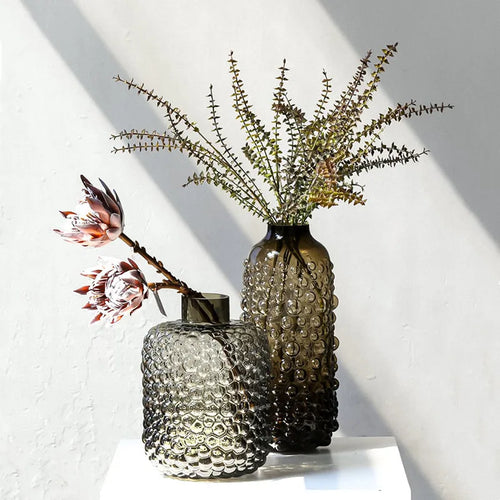 clear glass vase with black dots for decoration and floral arrangements