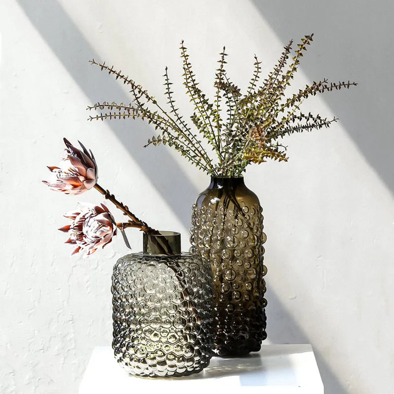 clear glass vase with black dots for decoration and floral arrangements