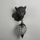 Resin leopard wall light