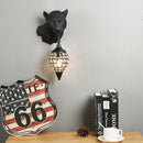 Resin leopard wall light