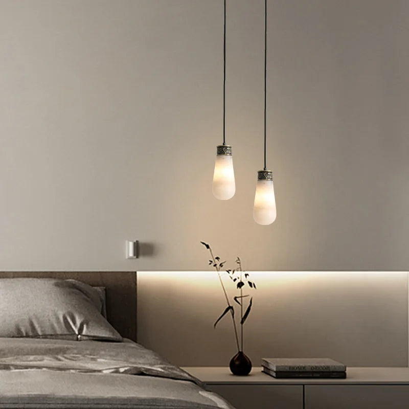 Creative marble and jade pendant light for interiors