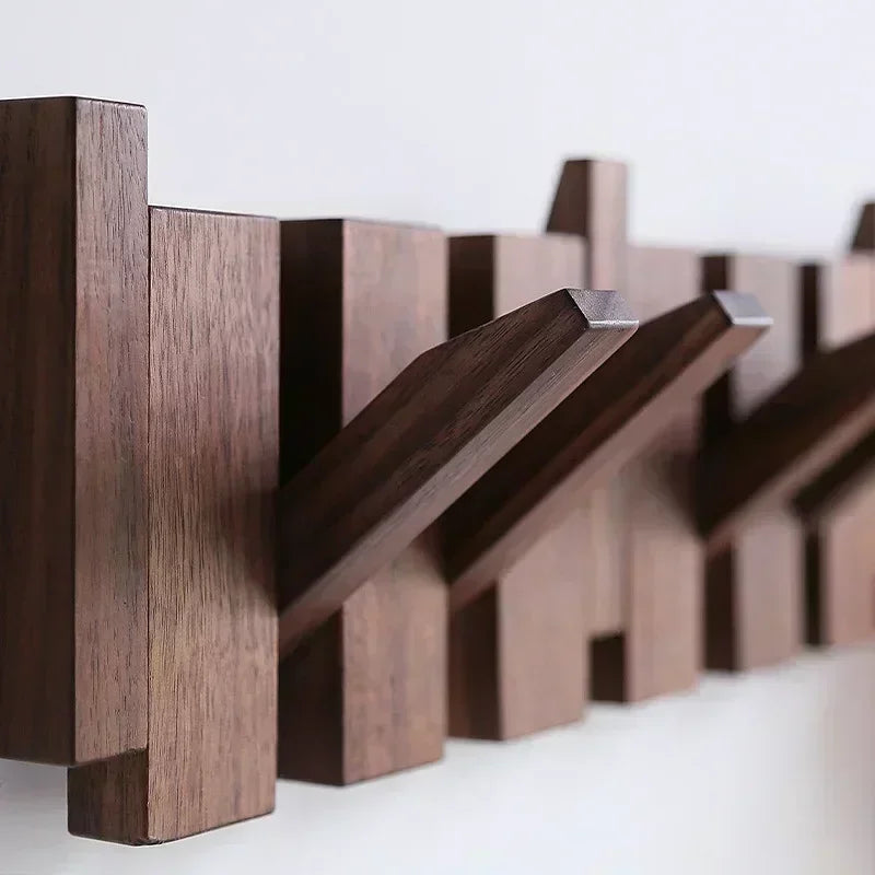 hanging walnut coat rack with creative solid wood hooks