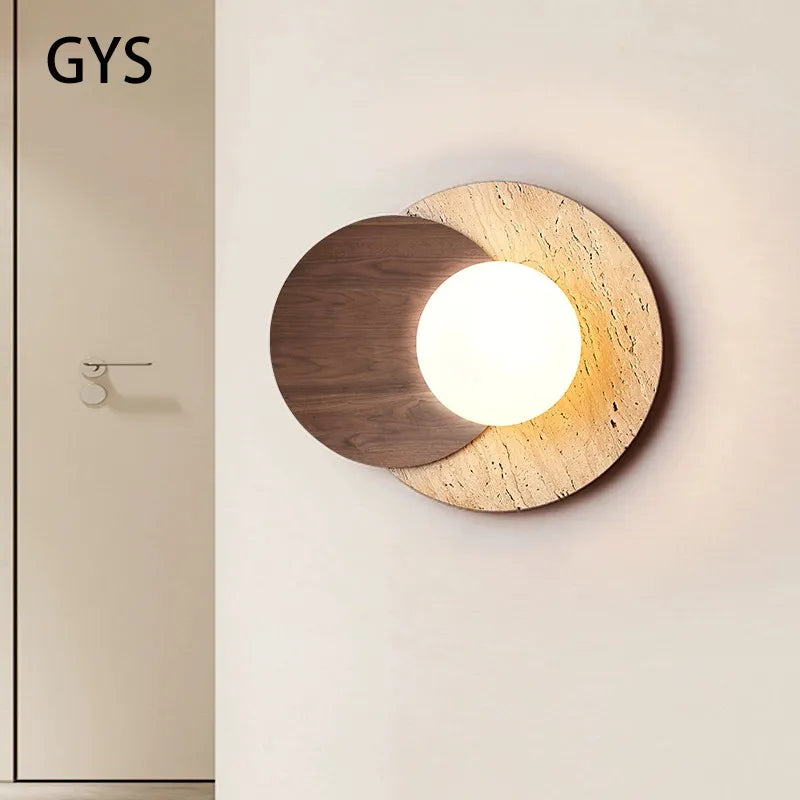 Round stone-style LED wall lamp in cream