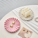 Elegant ceramic jewellery tray with modern scalloped design