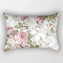 Decorative rectangular cushion cover with red and pink floral rainbow pattern
