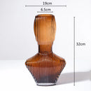 abstract glass sculpture with decorative stripes for interior decoration