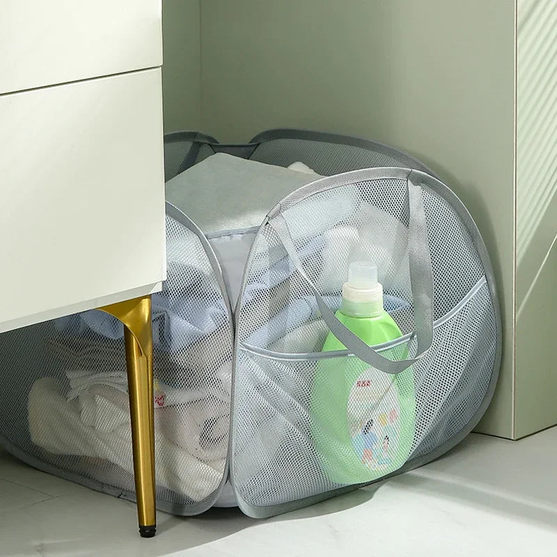 foldable laundry basket with reinforced handles for carrying