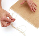 Rustic jute table runner with tassels