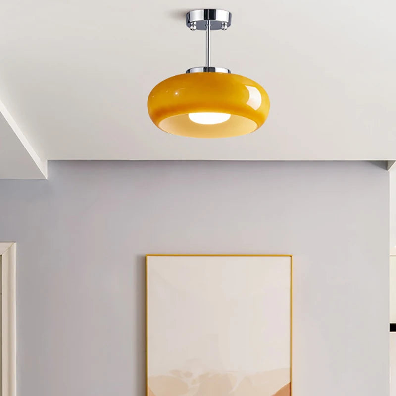 Modern glass chandelier with gold and chrome metal pendant lights