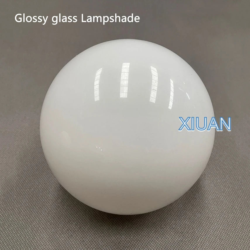 Modern glass globe lamp with concealed base for versatile use