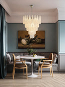 Coloured glass pendant with decorative leaf for chic interiors