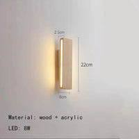 Rotating wooden LED wall light