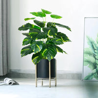 Artificial monstera plant with large leaves for indoor decoration