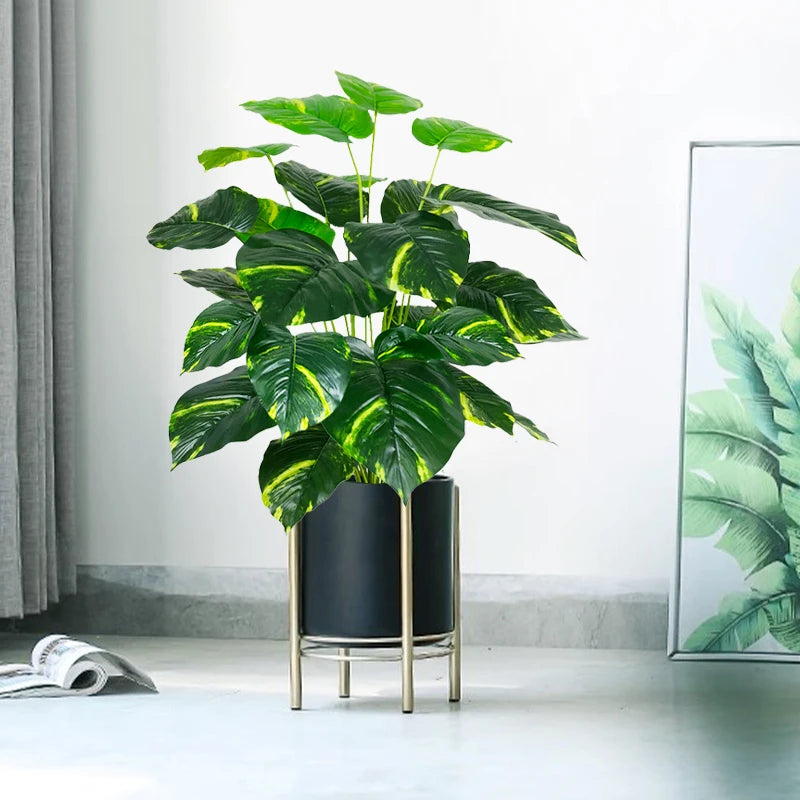Artificial monstera plant with large leaves for indoor decoration