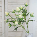 Decorative artificial sea holly flowers in pink and violet
