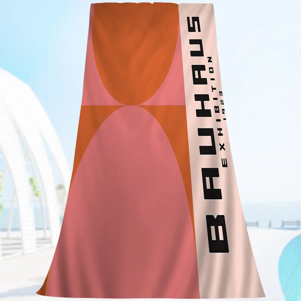 Microfibre beach towel with abstract bauhaus geometric pattern
