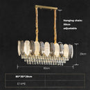 Art deco inspired LED crystal chandelier with white and grey feathers
