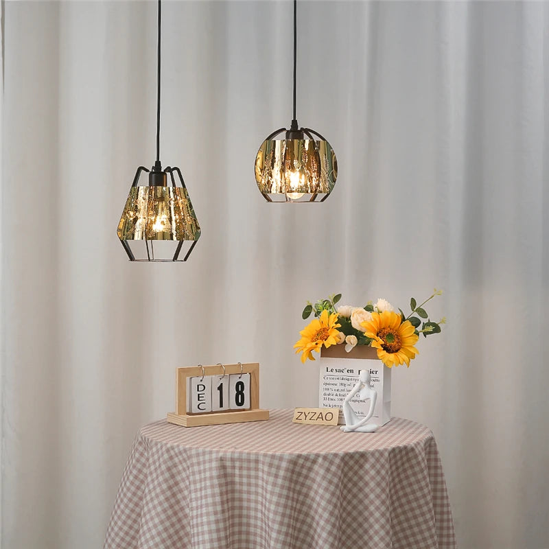 Creative Nordic pendant light with engraved gold lampshade