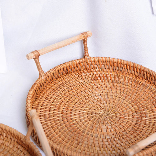 round woven rattan basket with handle for storage and display - vue 7 sur 7