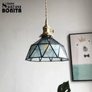 Pure glass pendant light with wave copper design