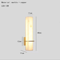Cuboid marble and copper wall light for ambient lighting