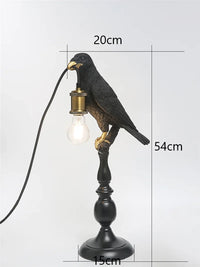 Modern resin bird-shaped desk lamp with golden beak