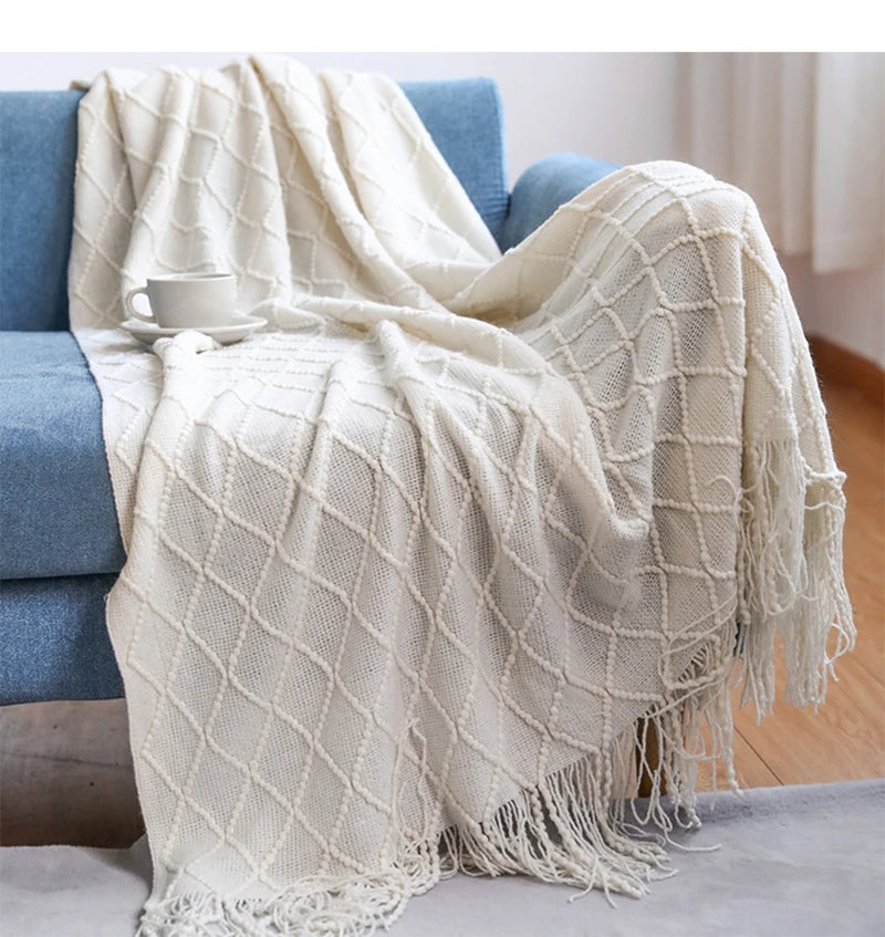 Nordic jacquard knitted throw with pom poms