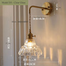 Vintage glass wall light with brass socket