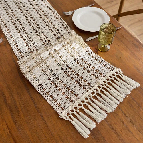 Beige boho table runner with tassels and geometric pattern