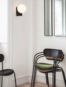 Minimalist stainless steel wall light for modern interiors