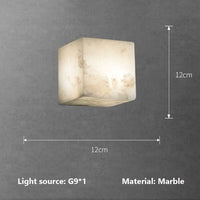 Cubical marble wall light for modern interiors