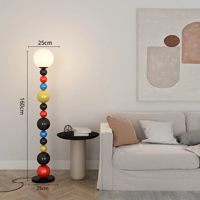 Modern floor lamp with colourful beads and glass shade