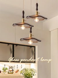 Modern brass and glass pendant light for interiors