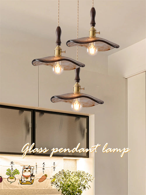 Modern brass and glass pendant light for interiors