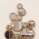 sun-shaped resin wall decor with hanging mirror