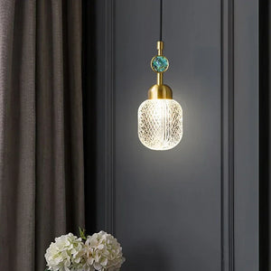 Modern adjustable gold pendant light with unique acrylic shade for interiors