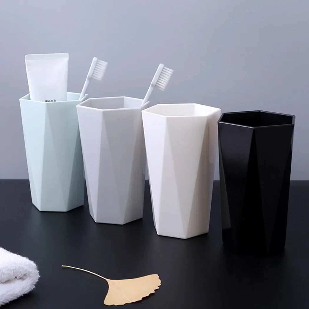 Solid plastic mouthwash and toothbrush cup