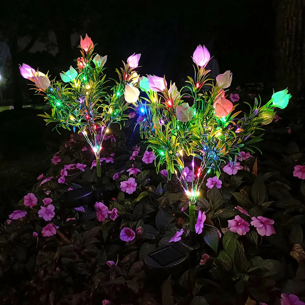 Decorative solar garden lamp with luminous flower design