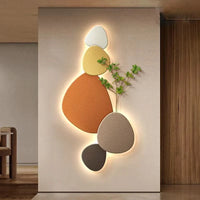 Modern decorative wall light with green plant design