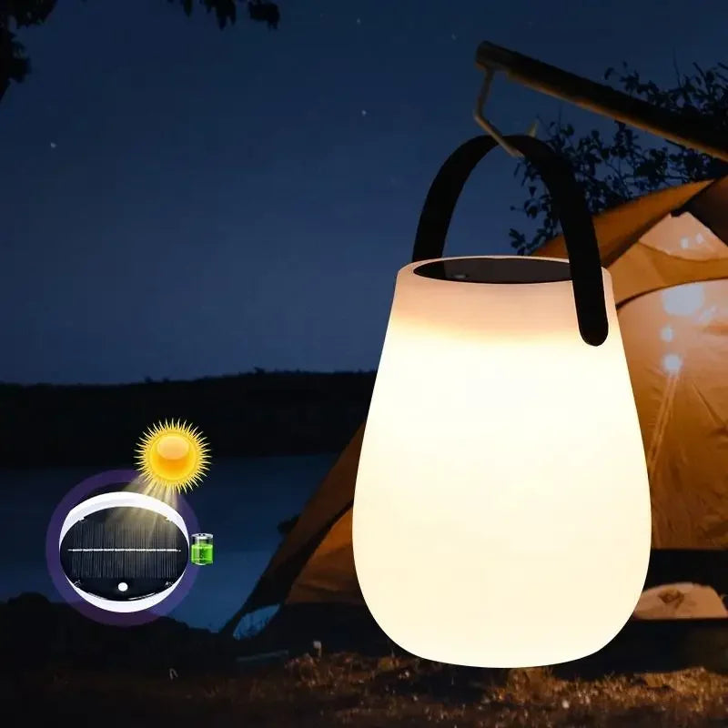 Rechargeable solar camping lamp with silicone handle