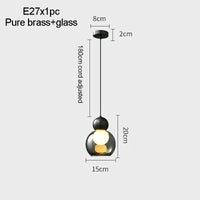 Transparent glass pendant light with decorative copper head