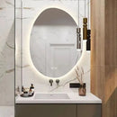 Irregular shaped LED mirror for smart dressing rooms and bathrooms