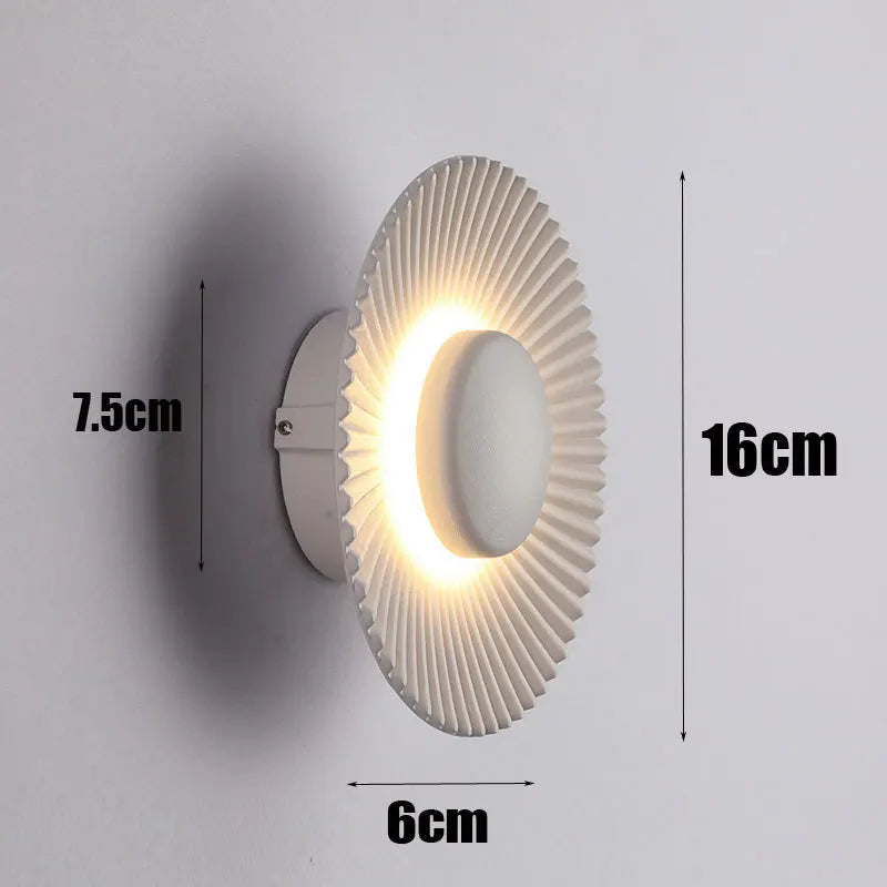 Modern disc-shaped LED wall light for hotel and restaurant