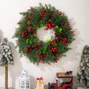Artificial Christmas wreath with decorative red berries